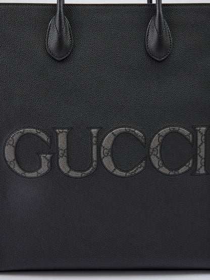GUCCI Sac fourre-tout moyen en cuir noir avec logo